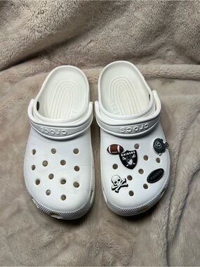 Crocs women’s size 10 mens size 8 raiders football